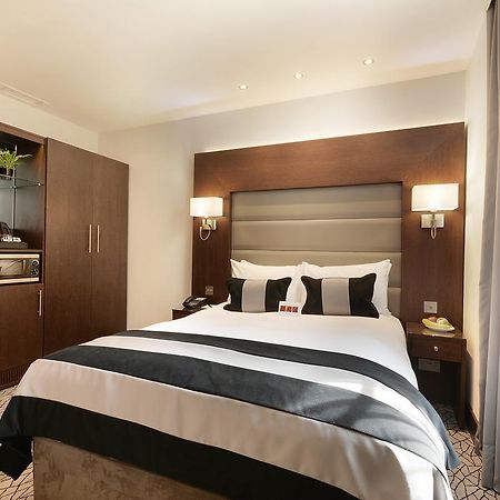 ホテル パーク グランド ロンドン ランカスター ゲート エクステリア 写真 A bedroom at the hotel