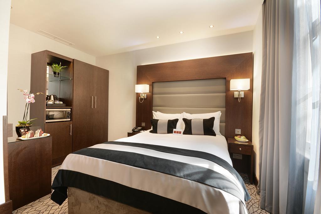 ホテル パーク グランド ロンドン ランカスター ゲート エクステリア 写真 A bedroom at the hotel