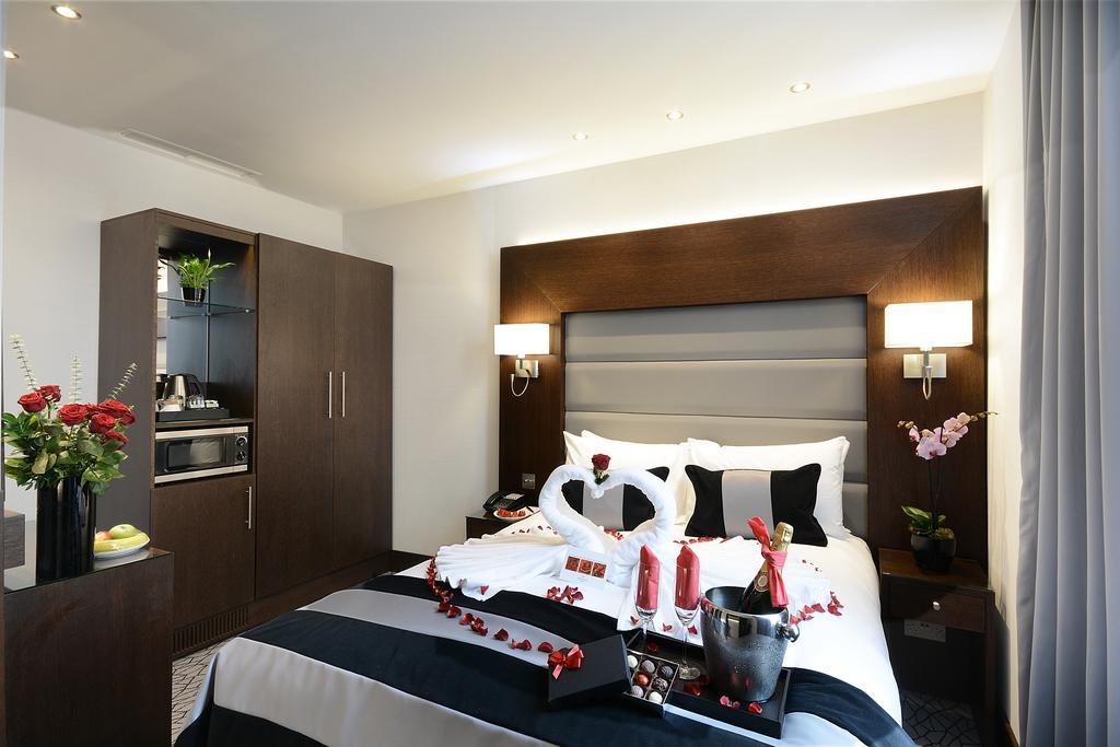 ホテル パーク グランド ロンドン ランカスター ゲート エクステリア 写真 A bedroom at the hotel